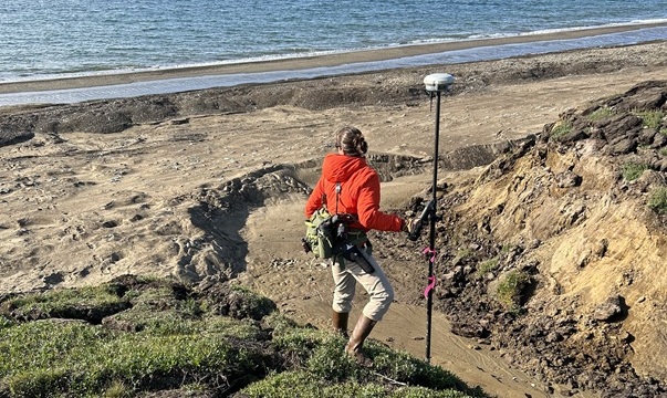 Coastal Hazards geologist collects profile data in Wainwright, Alaska