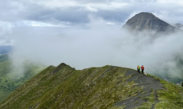>Geologists traverse the Talkeetna Mountains