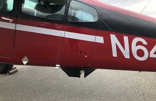 DGGS lidar scanner mounted beneath a Cessna 180 Skywagon